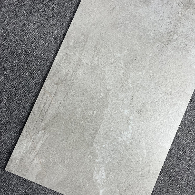 1200x600は壁を半タイルを張る居間の無作法な耐久力のあるマットの灰色Wabi Sabiを織った